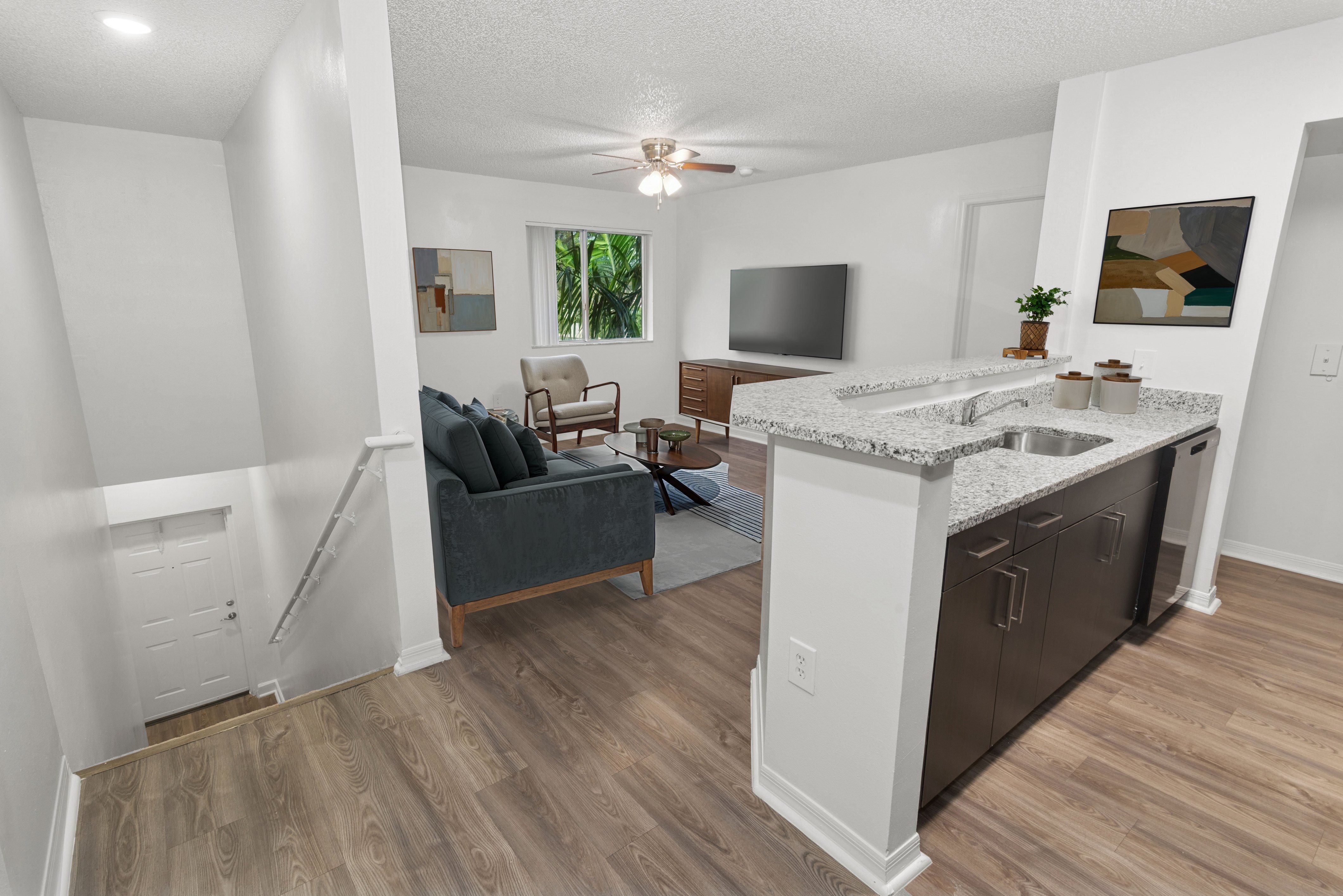 Kitchen and Living Room at Running Brook Apartments in Miami FL
